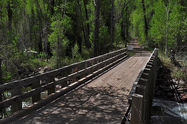 a private bridge crosses the river